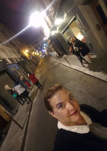 Woman in France taking selfie