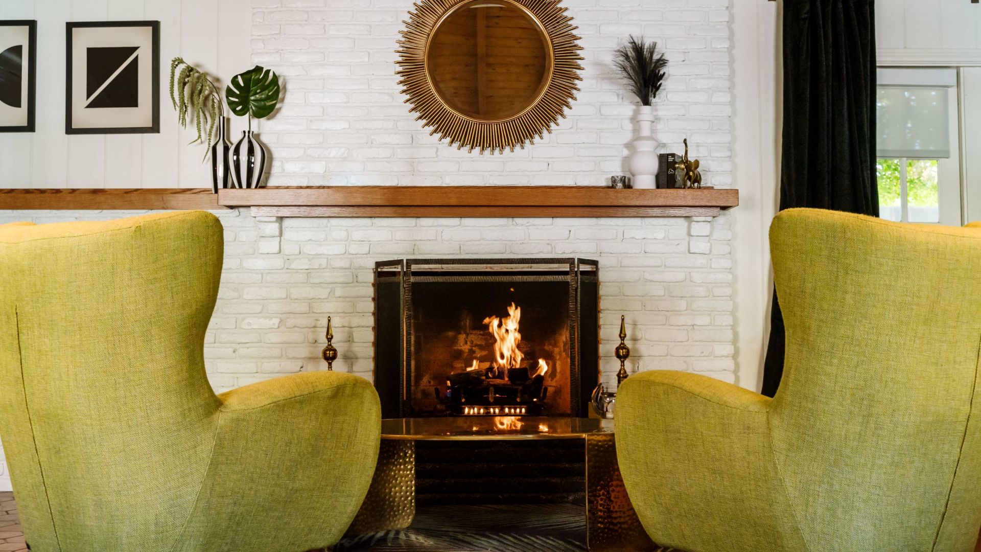 A Fire Place Sitting In A Living Room With A Fireplace
